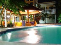 The bar by night of the Apart-Hotel CAUCHO - Boca Chica - Dominican Republic